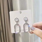 Boucles d'oreilles pendantes exagérées en strass pour femmes