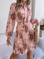 Robe longue plissée élégante à manches longues et taille nouée à imprimé floral pour femme