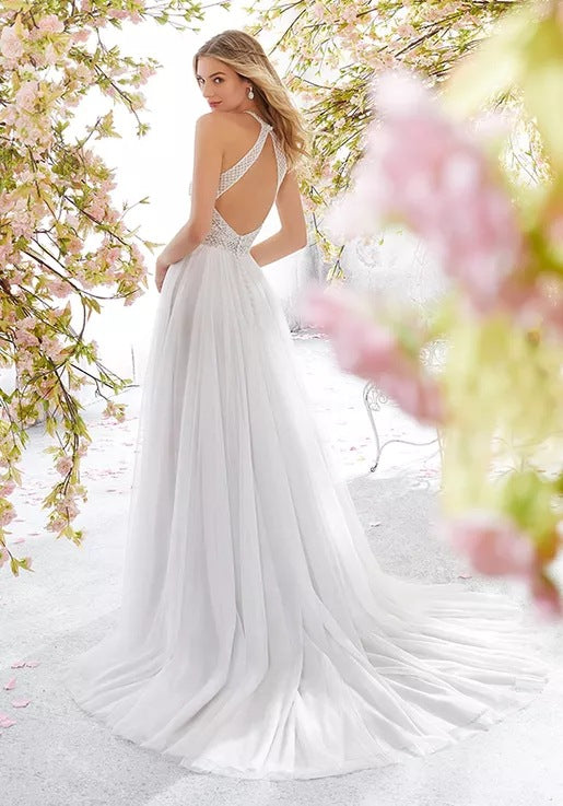 Robe de mariée bustier sans manches avec jupe longue ajustée