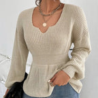 Pull femme à volants et taille ajustée