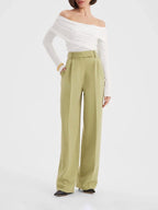 Ensemble veste de costume verte cintrée et pantalon taille haute