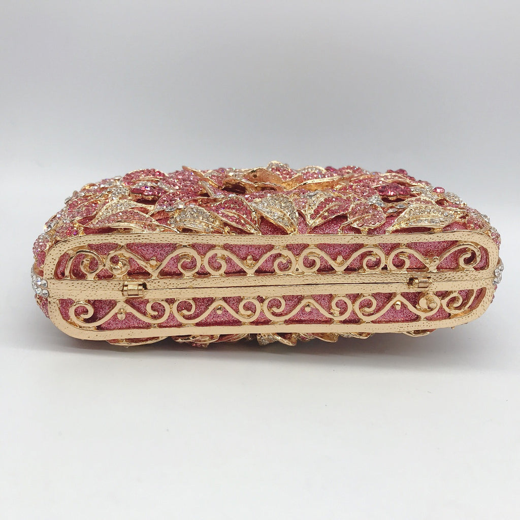 Pochette de soirée en métal rose, chaîne et diamants