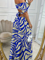 Robe longue à col une ligne imprimé et manches courtes avec taille creuse, pour les vacances d'été. Vêtements pour femmes.