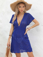 Robe tissée décolletée en V profond et dos nu