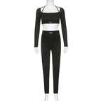 Ensemble deux pièces moulant tricoté de couleur unie avec lettres, haut court à manches longues et col rond, et leggings skinny taille haute