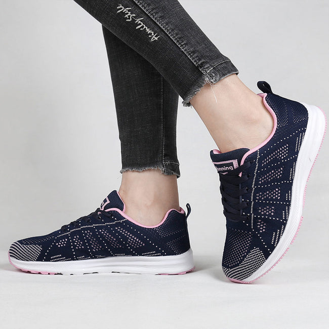 Baskets noires et blanches à lacets pour femme pour la course à pied et la marche Main Image