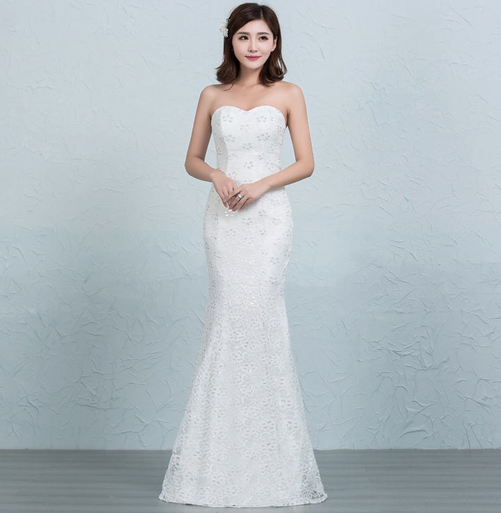 Robe de mariée sirène en dentelle sequinée à la taille