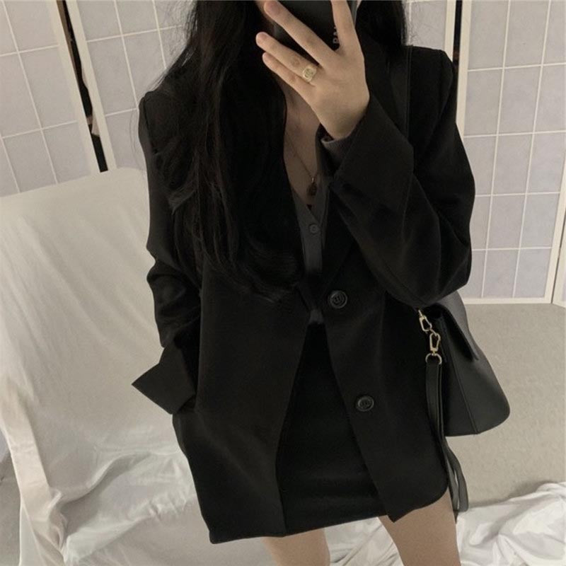 Blazer ample noir à revers et jupe assortie