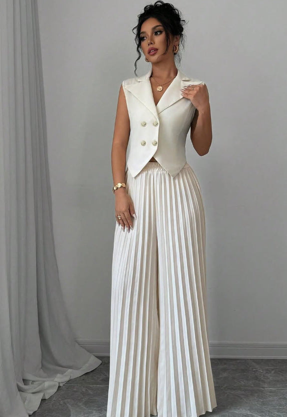Ensemble de vêtements d'été sans manches pour femmes, avec veste à revers boutonnée et pantalon plissé droit.