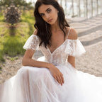 Robe de mariée grande taille amincissante pour les épaules
