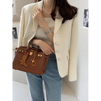 Veste en tweed cintrée, blazer à manches longues
