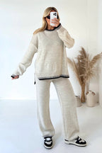 Ensemble deux pièces mode pour femme : haut pull à manches longues fendues et pantalon droit ample de couleur unie