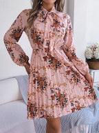 Robe longue plissée élégante à manches longues et taille nouée à imprimé floral pour femme