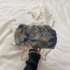 Pochette de soirée brodée avec bandoulière chaîne