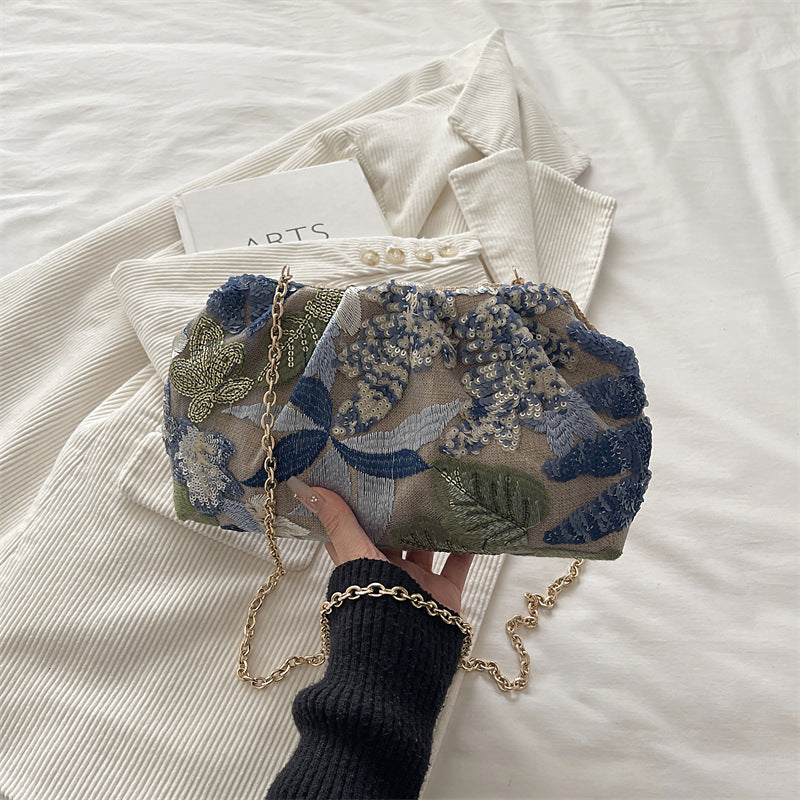 Pochette de soirée brodée avec bandoulière chaîne