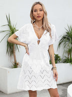 Robe tissée décolletée en V profond et dos nu
