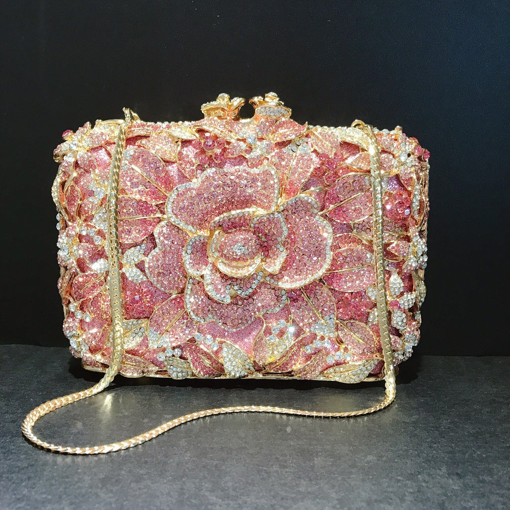 Pochette de soirée en métal rose, chaîne et diamants