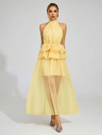 Flowy Ruffled Wedding Dress With A Halter Neckline