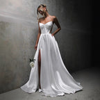 Robe de mariée bandage en satin blanc à poches fendues