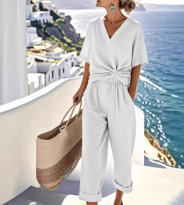 Ensemble deux pièces pour femme, couleur unie, coupe irrégulière, manches courtes, costume d'été, col en V, coupe ajustée, tenue de bureau décontractée, haut plissé irrégulier et pantalon.