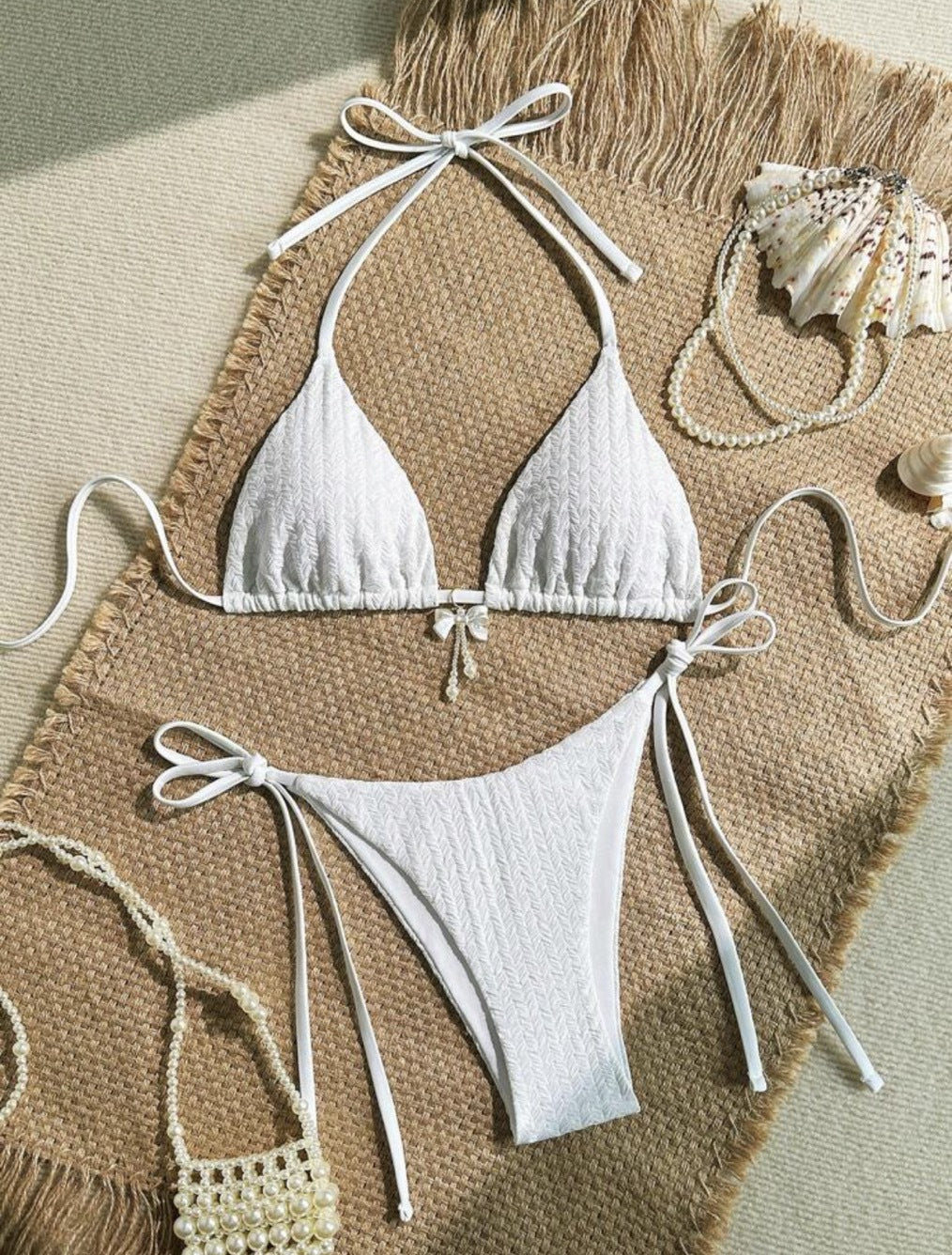 Maillot de bain bikini féminin dos nu à fines bretelles de couleur unie