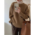 Pull col rond en maille torsadée pour femme