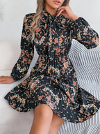 Robe longue plissée élégante à manches longues et taille nouée à imprimé floral pour femme