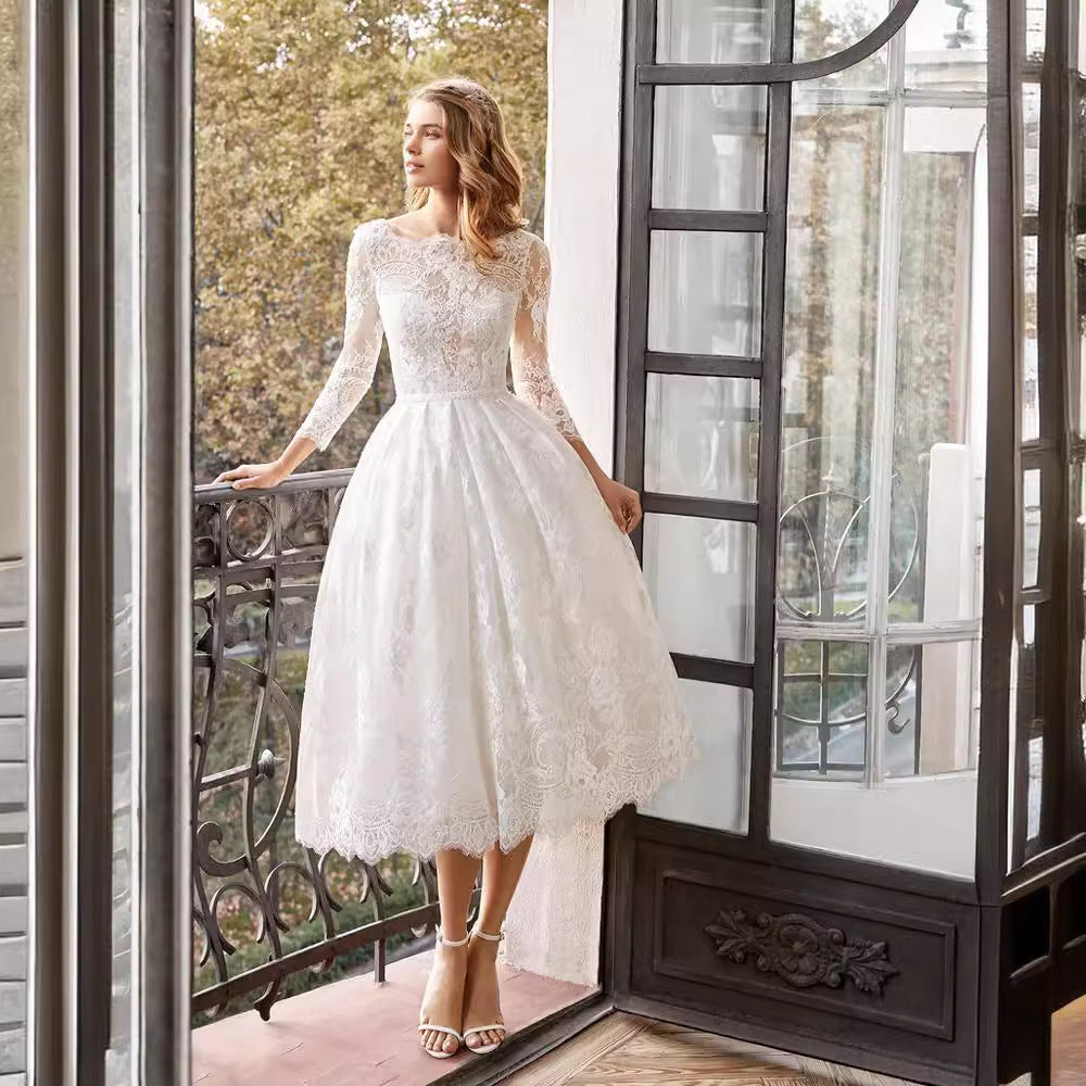 Robe de mariée mi-longue slim manches longues