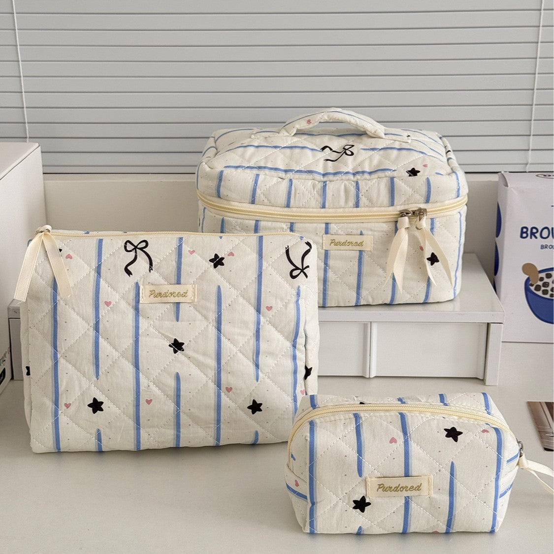 Trousse de maquillage grande capacité à nœud papillon