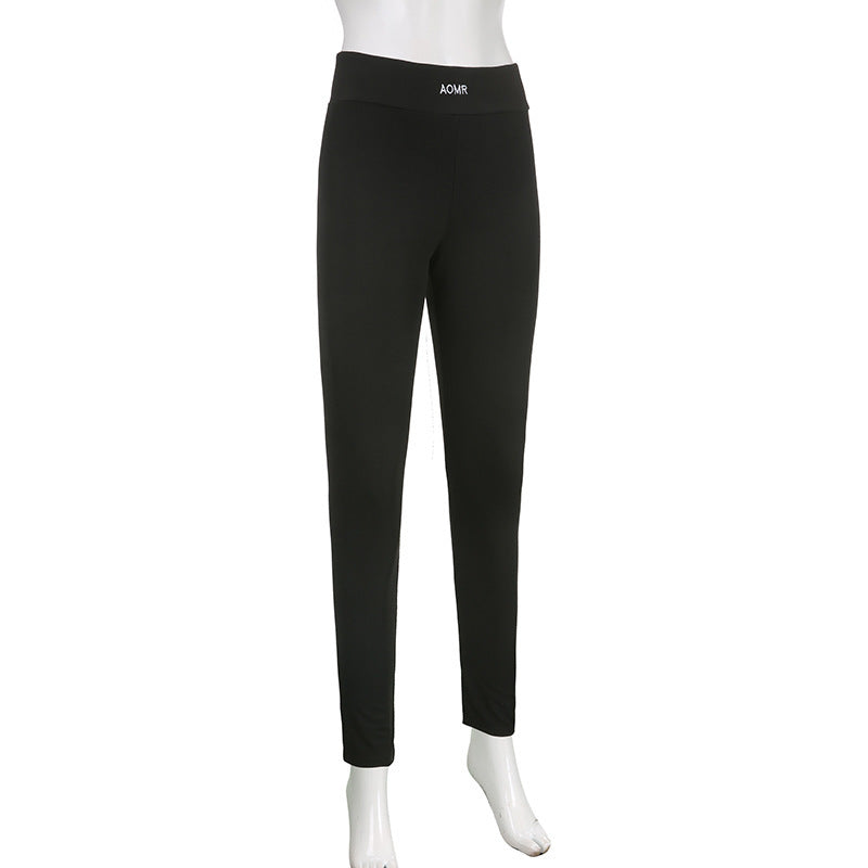 Ensemble deux pièces moulant tricoté de couleur unie avec lettres, haut court à manches longues et col rond, et leggings skinny taille haute