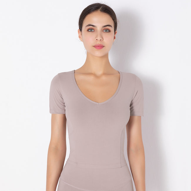 Haut de sport de yoga à manches courtes de couleur unie, extensible et sans coutures pour femme Main Image
