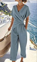 Ensemble deux pièces pour femme, couleur unie, coupe irrégulière, manches courtes, costume d'été, col en V, coupe ajustée, tenue de bureau décontractée, haut plissé irrégulier et pantalon.
