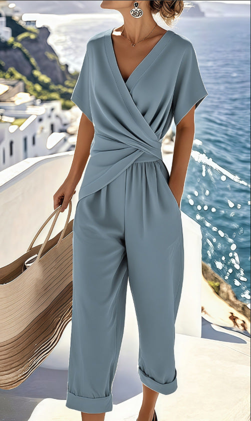 Ensemble deux pièces pour femme, couleur unie, coupe irrégulière, manches courtes, costume d'été, col en V, coupe ajustée, tenue de bureau décontractée, haut plissé irrégulier et pantalon.