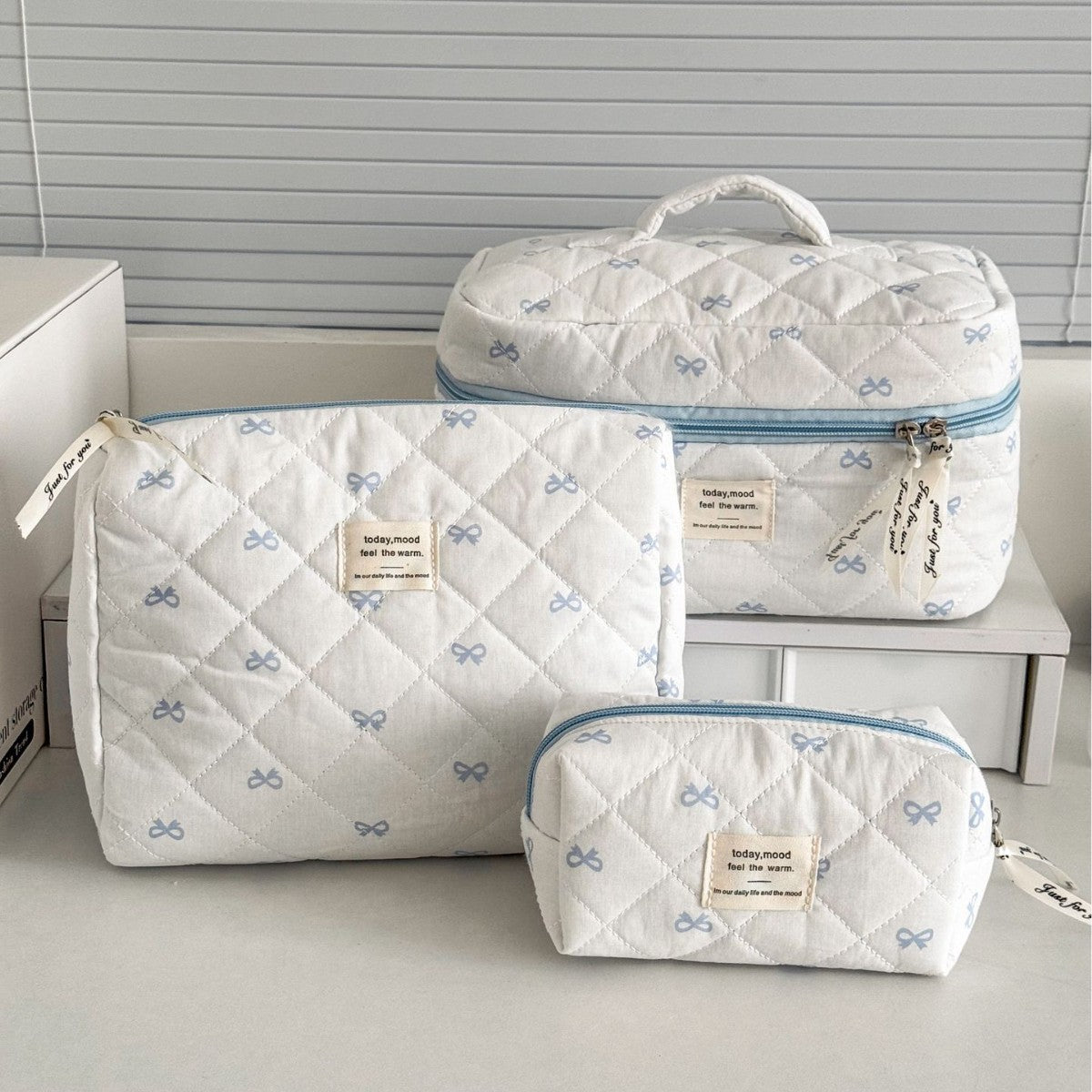 Trousse de maquillage grande capacité à nœud papillon