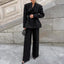 Ensemble deux pièces pantalon et veste de costume ajustée à la taille plissée, col en V et manches longues noires