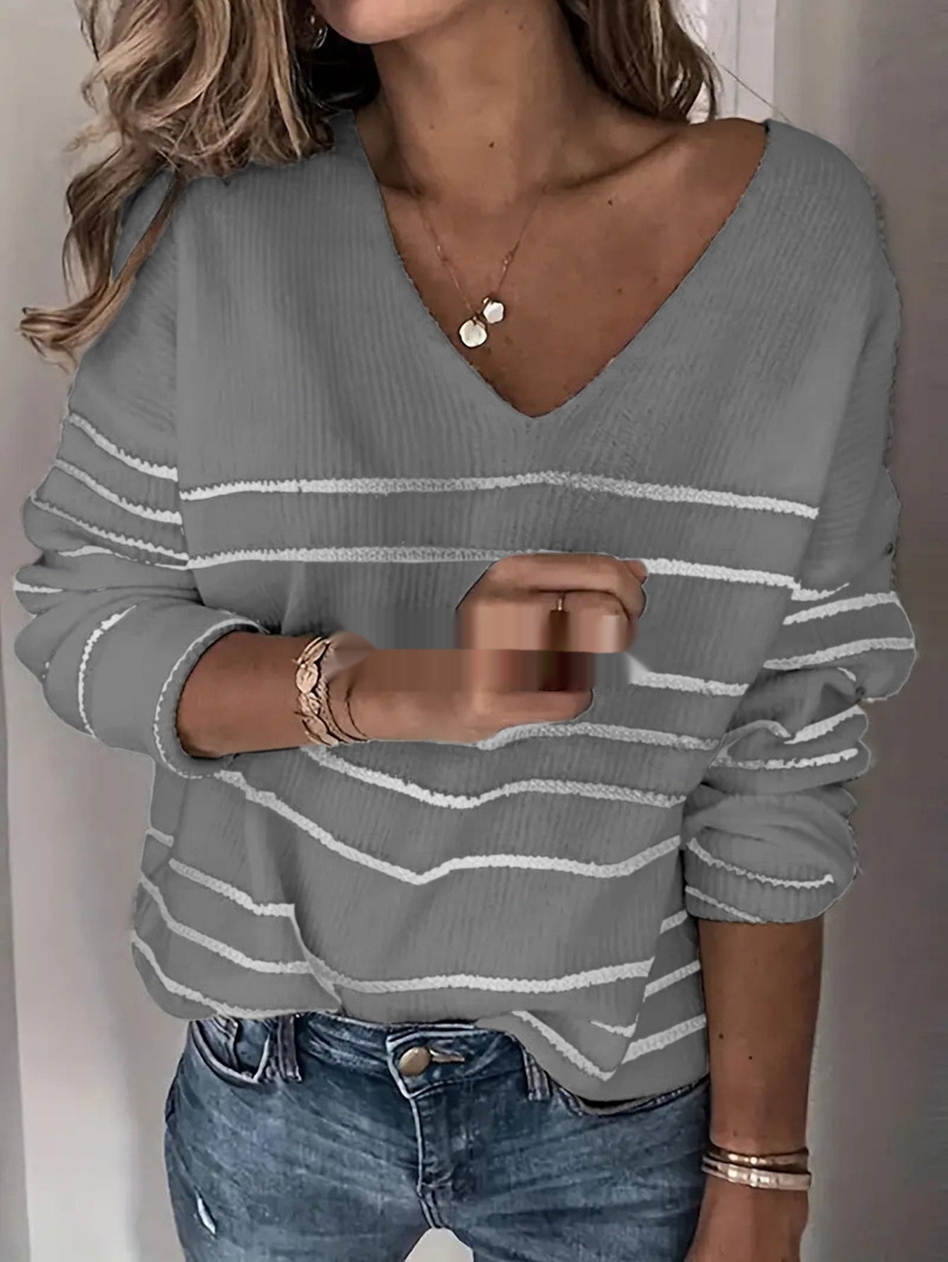 Pull tricoté à rayures col en V pour femme
