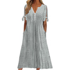 Robe longue d'été en broderie anglaise à col en V pour femme, manches courtes, coupe ample évasée pour la plage