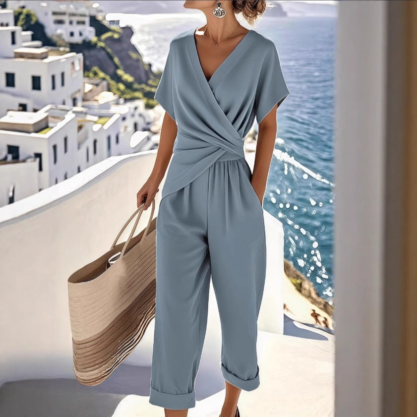 Ensemble deux pièces pour femme, couleur unie, coupe irrégulière, manches courtes, costume d'été, col en V, coupe ajustée, tenue de bureau décontractée, haut plissé irrégulier et pantalon.
