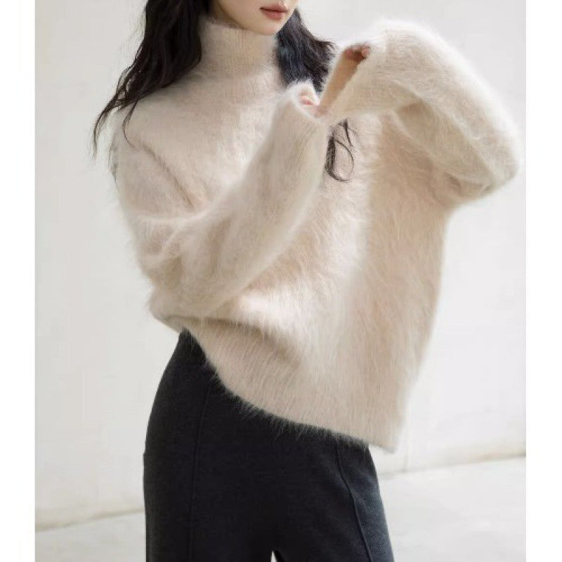 Pull col roulé en mohair gris pour femme