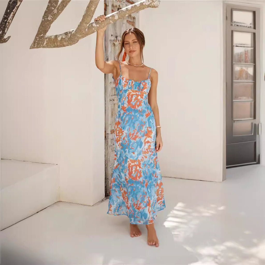 Robe à fines bretelles décolletée dos nu pour femme