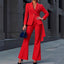 Ensemble tailleur pantalon évasé ceinturé à taille cintrée et un bouton