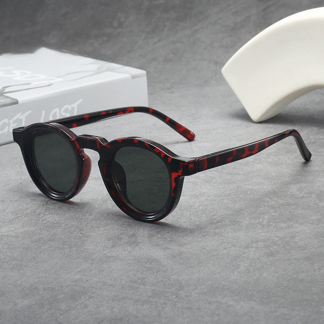 Lunettes de soleil rondes vintage pour femme Main Image