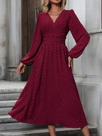 Robe à manches lanternes et taille plissée