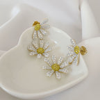 Boucles d'oreilles élégantes en forme de marguerite pour femmes, bijoux de mode, accessoires en cuivre plaqué or