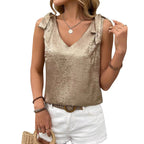 Camisole sans manches en dentelle avec nœud papillon et décolleté en V pour femme, avec détails dorés en relief