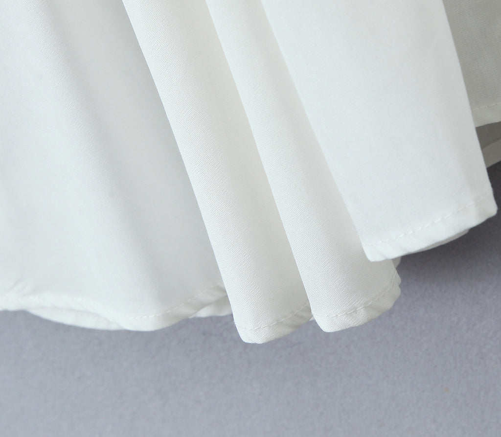 Robe sans manches florale licou en V style Hepburn français