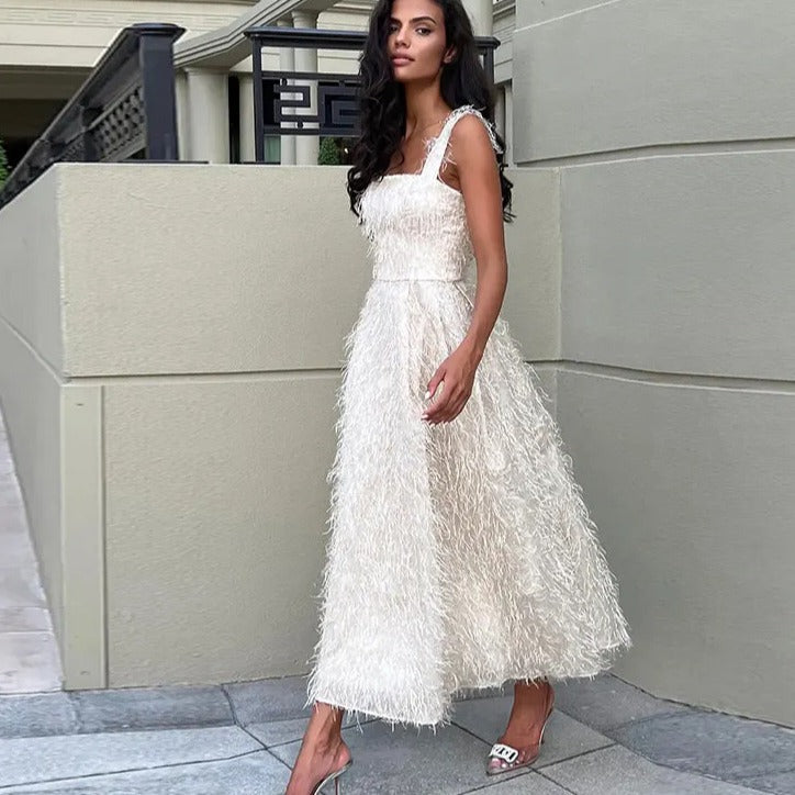 Robe sans manches à pompons pour femme