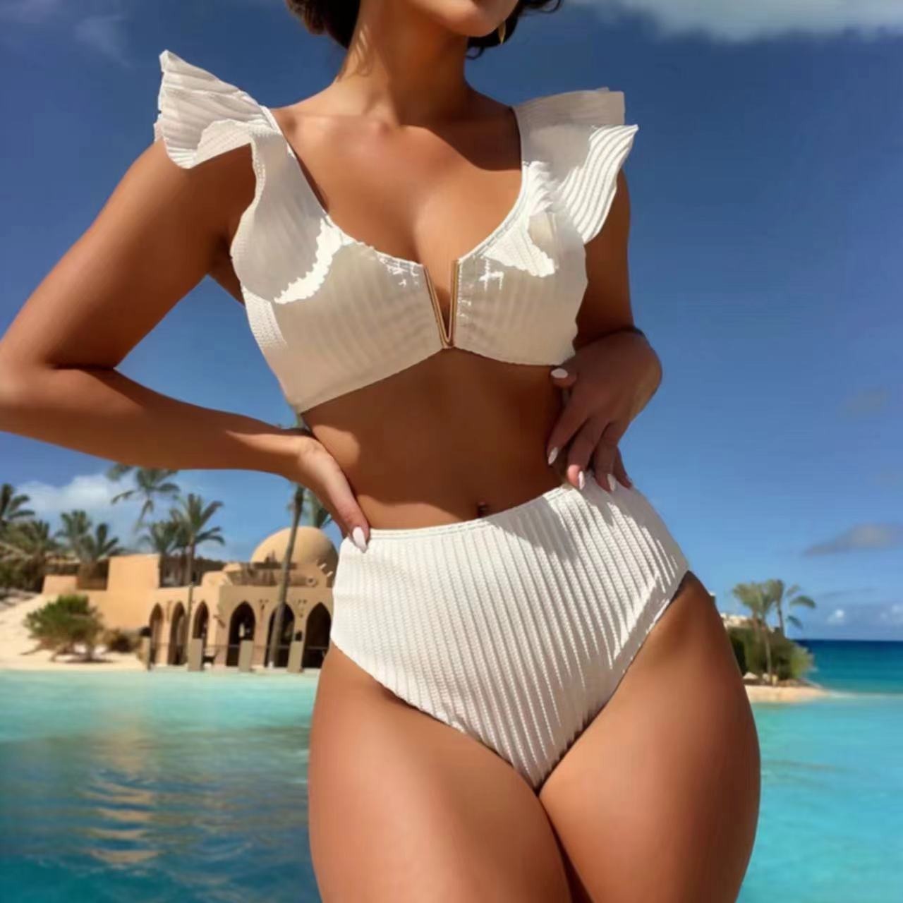 Haut de bikini volanté en tissu côtelé de couleur unie