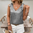 Camisole sans manches en dentelle avec nœud papillon et décolleté en V pour femme, avec détails dorés en relief