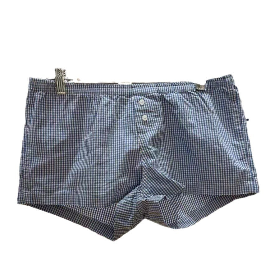 Shorts à carreaux rouges avec taille élastique et décoration de fermeture pour femmes